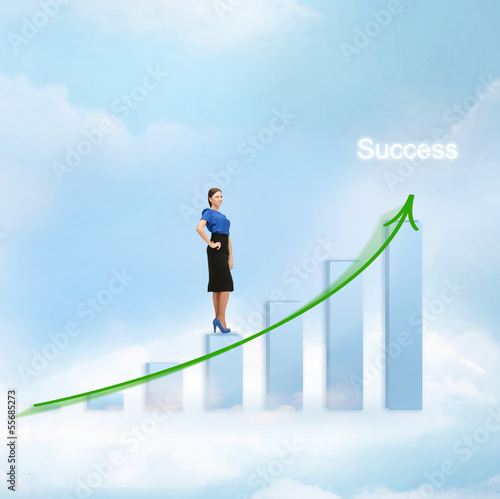 Photo: businesswoman with big 3d chart in the sky businesswoman with big 3d chart in the sky