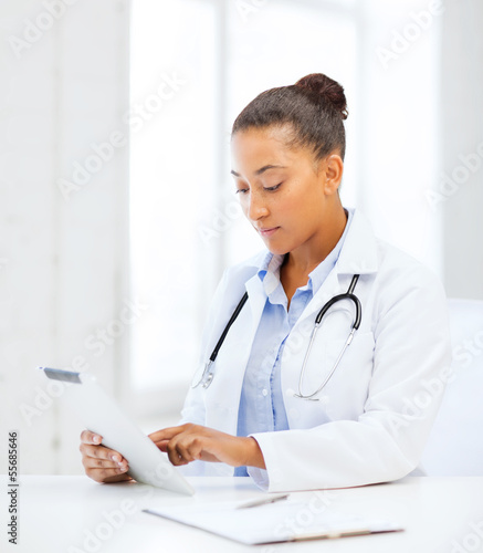 Photo: african female doctor with tablet pc african female doctor with tablet pc