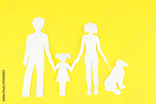 Photo: Family from paper on bright background Family from paper on bright background