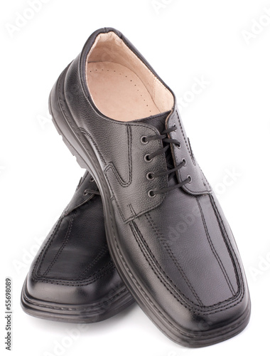 Photo: Black glossy man’s shoes with shoelaces Black glossy man’s shoes with shoelaces