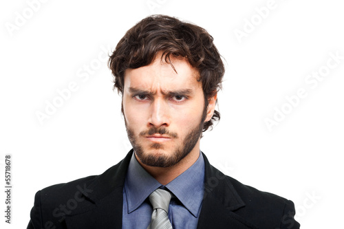Photo: Angry businessman isolated on white Angry businessman isolated on white