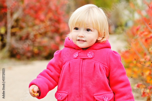 Photo: baby girl walking in fall park baby girl walking in fall park