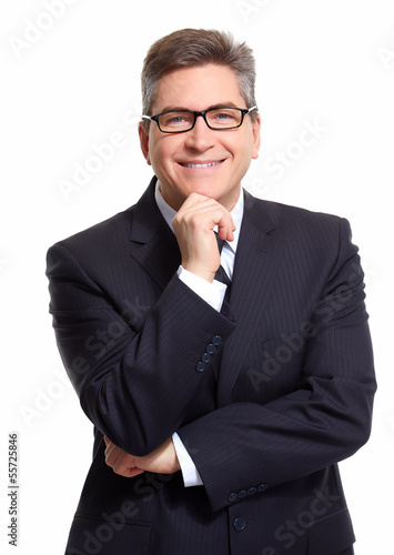 Photo: Businessman isolated on white. Businessman isolated on white.