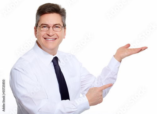 Photo: Businessman isolated on white. Businessman isolated on white.