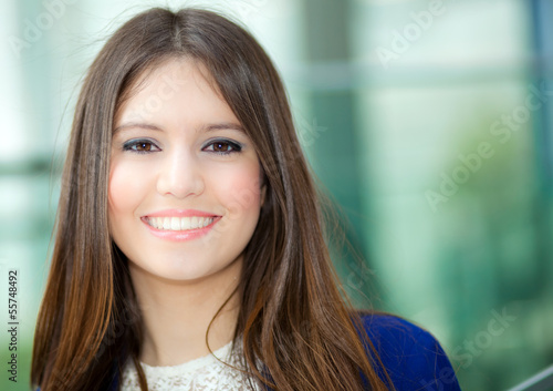 Photo: Smiling businesswoman outdoor Smiling businesswoman outdoor