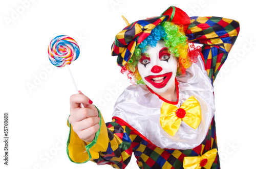 Photo: Clown with lollipops isolated on white Clown with lollipops isolated on white