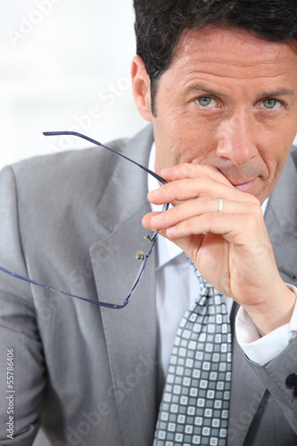 Photo: businessman with glasses businessman with glasses