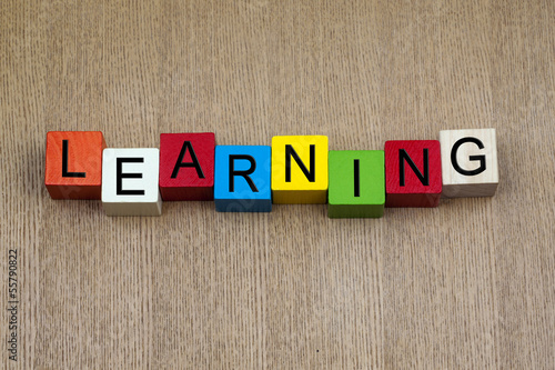 Photo: Learning - sign for education, business, skills. Learning - sign for education, business, skills.