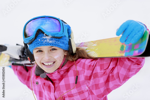 Photo: Skiing, skier, winter - portrait of happy young skier Skiing, skier, winter - portrait of happy young skier