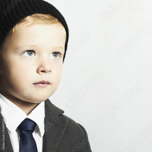 Photo: fashionable little boy in suit.style kid. fashion children fashionable little boy in suit.style kid. fashion children