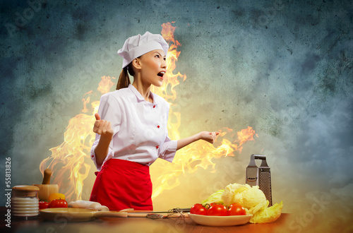 Photo: Asian female cook in anger Asian female cook in anger