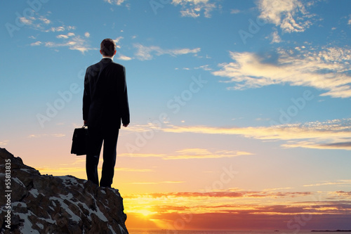 Photo: Businessman on top of hill Businessman on top of hill