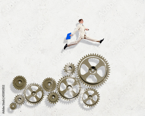 Illustration: Businessman and mechanism elements Businessman and mechanism elements