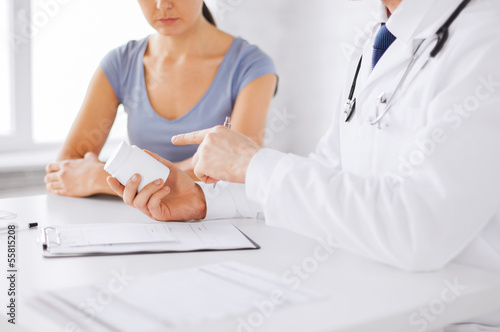 Photo: patient and doctor prescribing medication patient and doctor prescribing medication