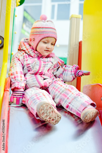 Photo: toddler girl on the playground toddler girl on the playground
