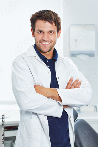 Photo: Smiling dentist with arms crossed Smiling dentist with arms crossed