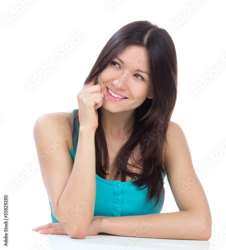 Photo: Happy woman calling on the mobile cell phone Happy woman calling on the mobile cell phone