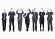 Photo: Medium group of business people in a row holding up paper with question mark, obscured face, studio shot Medium group of business people in a row holding up paper with question mark, obscured face, studio shot