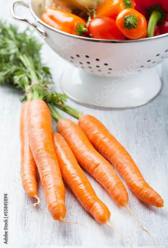 Photo: fresh carrot and vegetables in colander fresh carrot and vegetables in colander