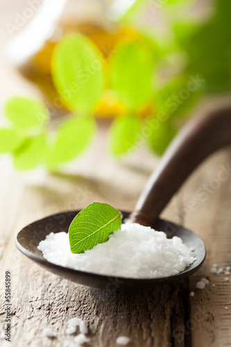 Photo: salt in wooden spoon for spa salt in wooden spoon for spa