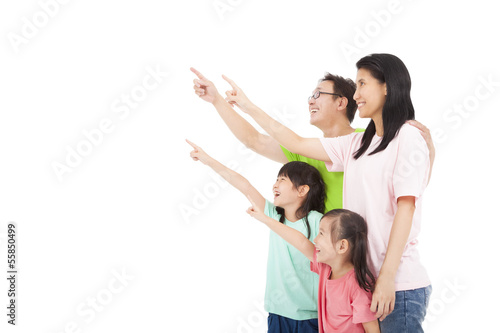 Photo: Happy asian family looking and pointing Happy asian family looking and pointing