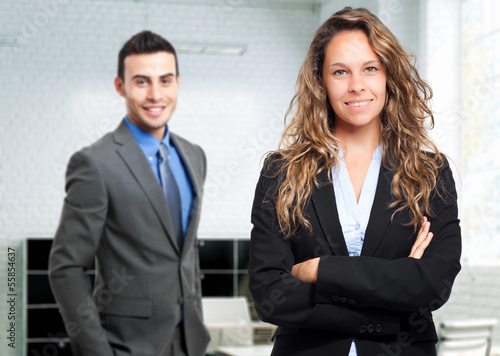 Photo: Business couple in the office Business couple in the office