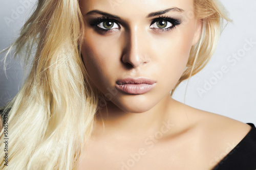 Photo: beautiful blond girl with green eyes.woman.professional make-up beautiful blond girl with green eyes.woman.professional make-up
