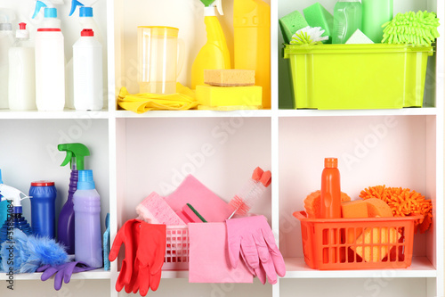 Photo: Shelves in pantry with cleaners for home close-up Shelves in pantry with cleaners for home close-up