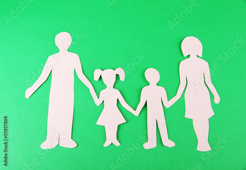 Photo: Family from paper on bright background Family from paper on bright background