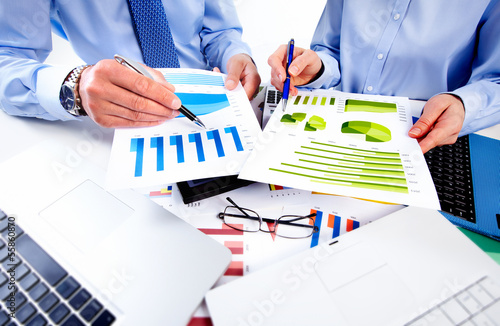 Photo: Business team working in the office. Business team working in the office.