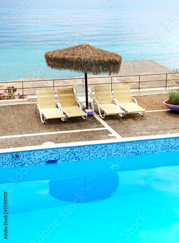 Photo: Sea view swimming pool in the luxury hotel, Peloponnes, Greece Sea view swimming pool in the luxury hotel, Peloponnes, Greece