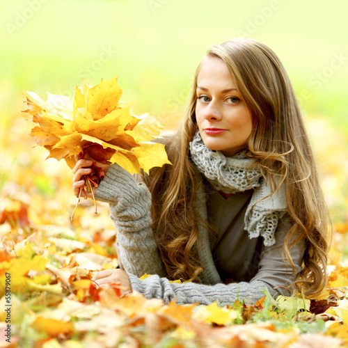 Photo: woman portret in autumn leaf woman portret in autumn leaf