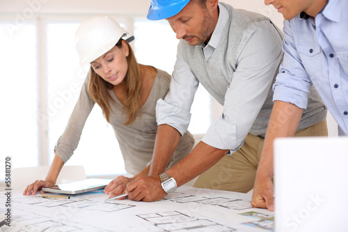 Photo: Construction people working on project Construction people working on project