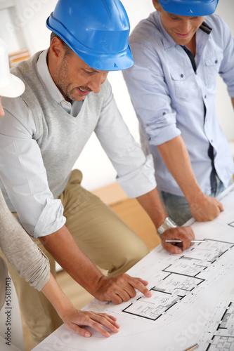 Photo: Construction people working on project Construction people working on project