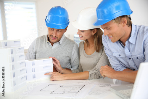 Photo: Construction people working on project Construction people working on project
