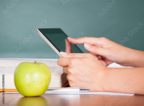 Photo: Hand holding digital tablet Hand holding digital tablet