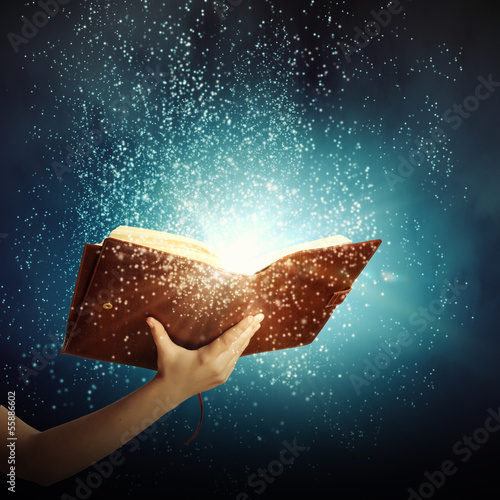 Photo: Hand with book Hand with book