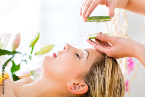 Photo: Wellness - woman having aloe vera application Wellness - woman having aloe vera application