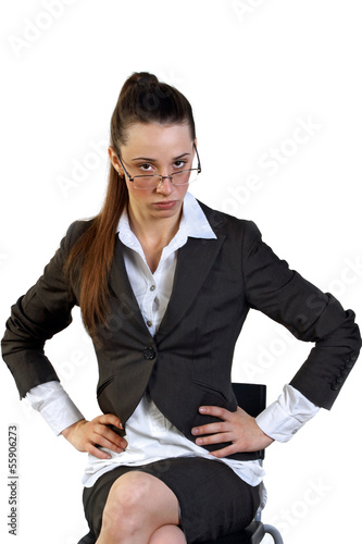 Photo: Serious business woman in glasses Serious business woman in glasses