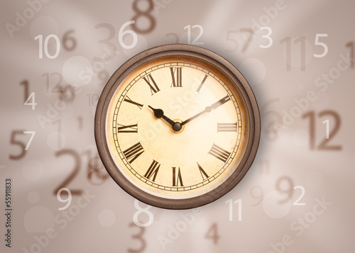 Photo: Vintage clock with numbers on the side Vintage clock with numbers on the side