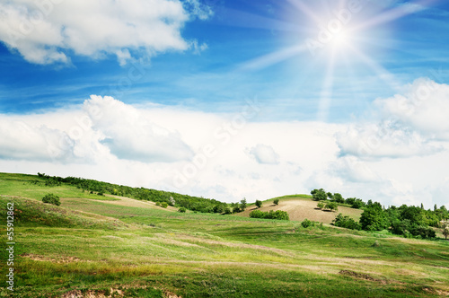 Photo: Mountainous terrain and the blue sky Mountainous terrain and the blue sky