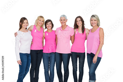 Photo: Smiling women wearing pink for breast cancer awareness Smiling women wearing pink for breast cancer awareness