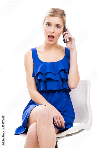 Photo: Beautiful woman talking by phone Beautiful woman talking by phone