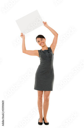 Photo: Business woman holding banner Business woman holding banner