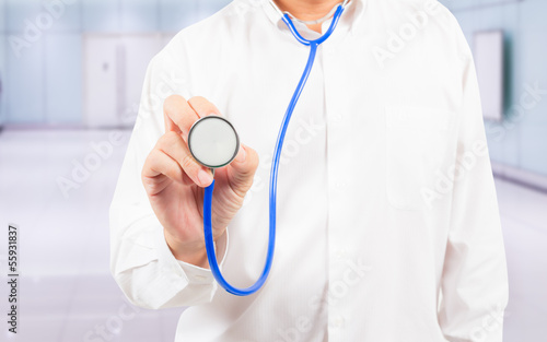 Photo: stethoscope in doctor's hand stethoscope in doctor's hand