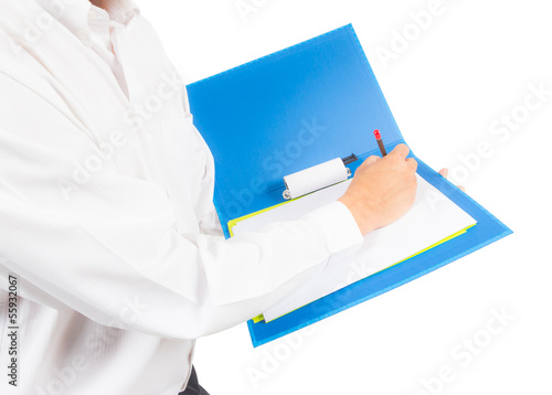 Photo: business man writing on notebook business man writing on notebook