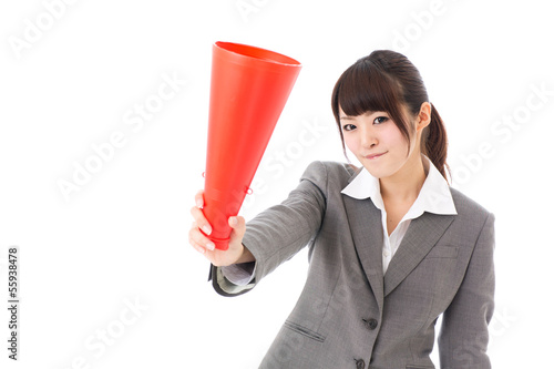 Photo: asian businesswoman using megaphone asian businesswoman using megaphone