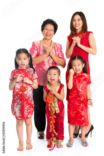 Photo: Asian Chinese family greeting on Chinese New Year Asian Chinese family greeting on Chinese New Year