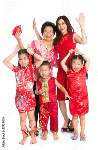 Photo: Asian Chinese family wishing you a happy Chinese New Year Asian Chinese family wishing you a happy Chinese New Year