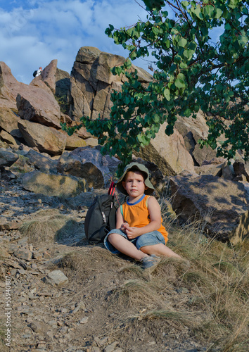 Photo: Educated little boy during a hiking expedition Educated little boy during a hiking expedition
